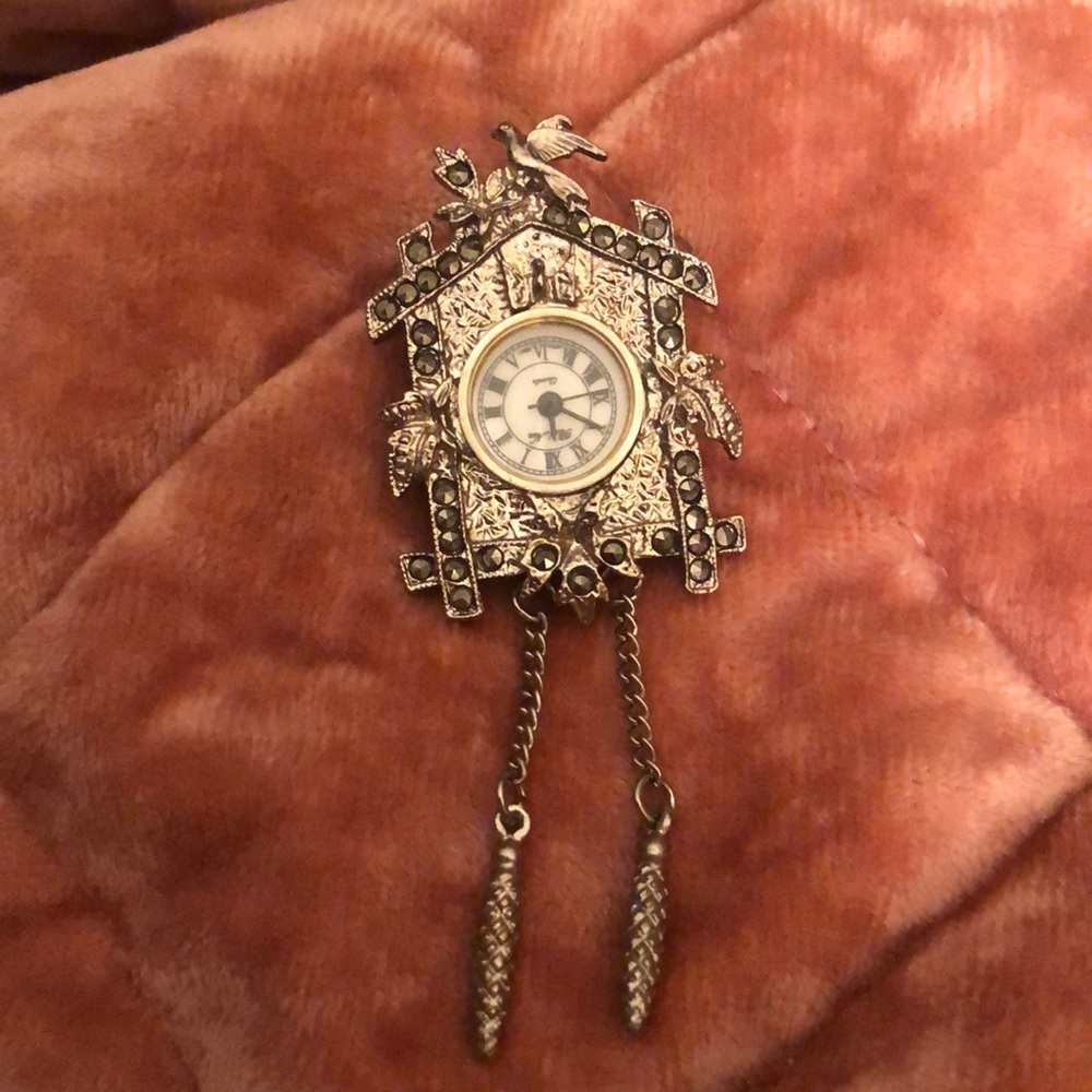 Silver colored vintage clock necklace and brooch